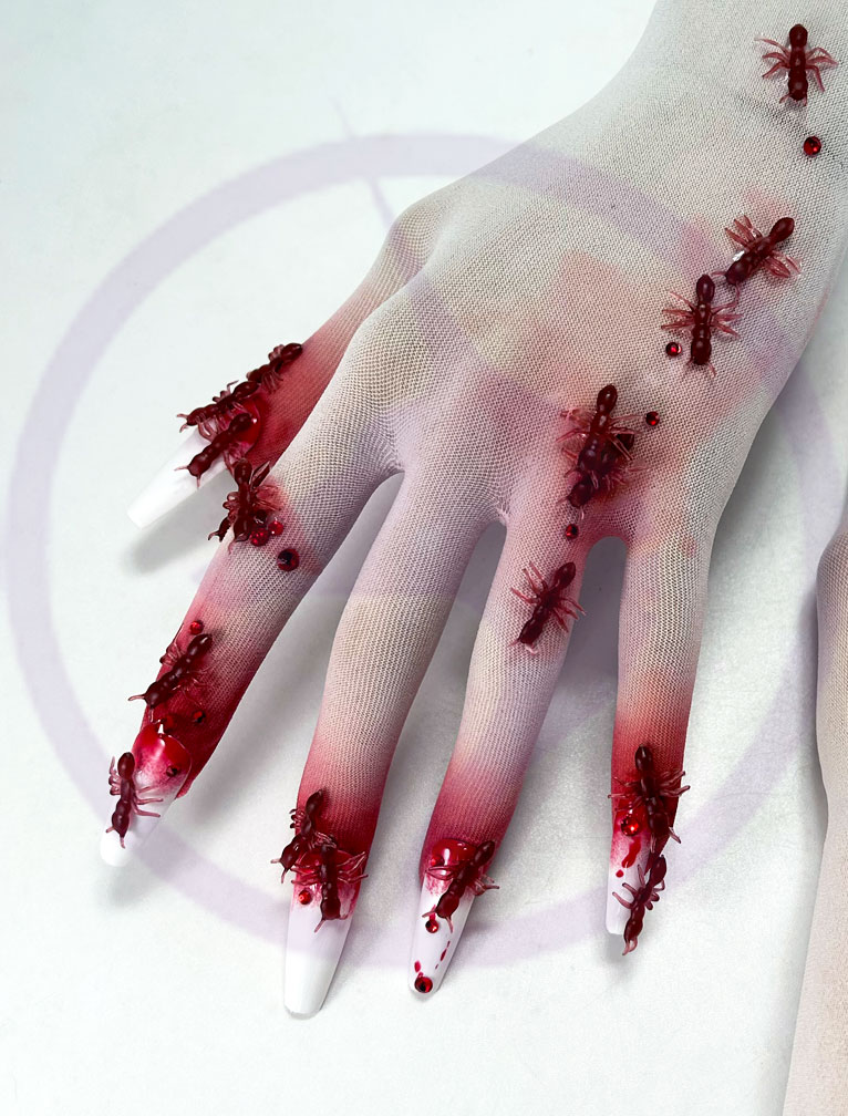 red-ant-nail-glove-left